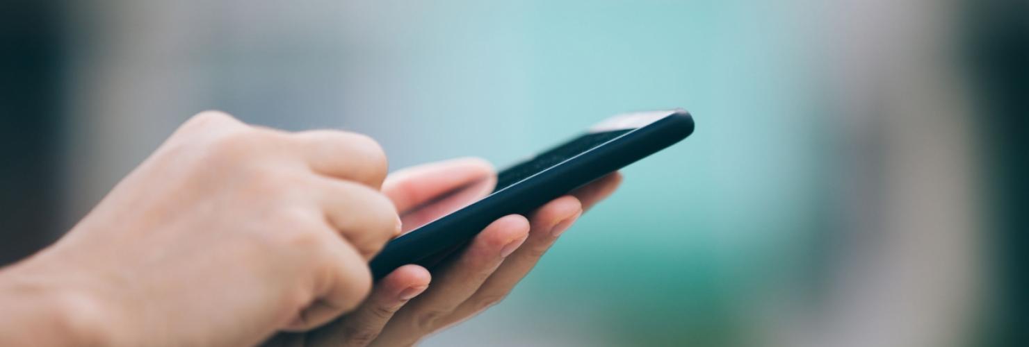 Close-up of a person holding a smartphone