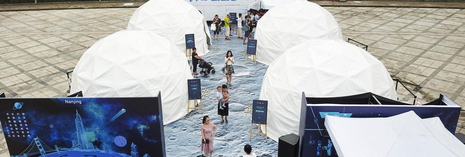 Visitors at the "Artificial Intelligence Science Popularization Exhibition" held by Baidu in Nanjing, September 2017. Image by ImagineChina.