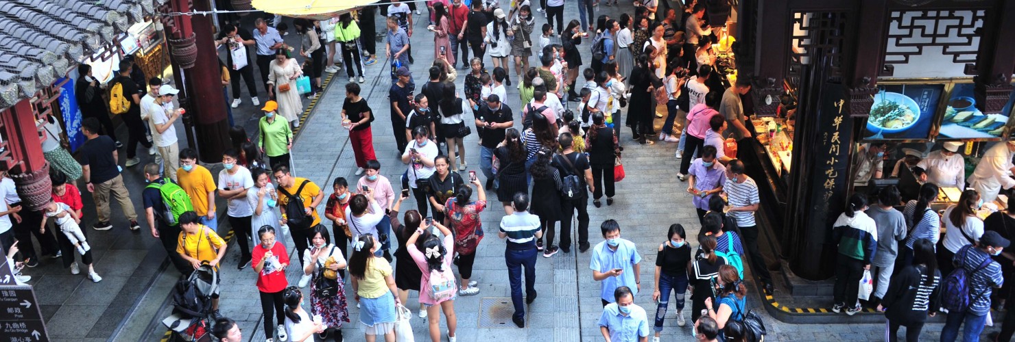 People enjoy the scenery near Yu Garden, a tourist attraction in Shanghai, China, 3 October 2020. 