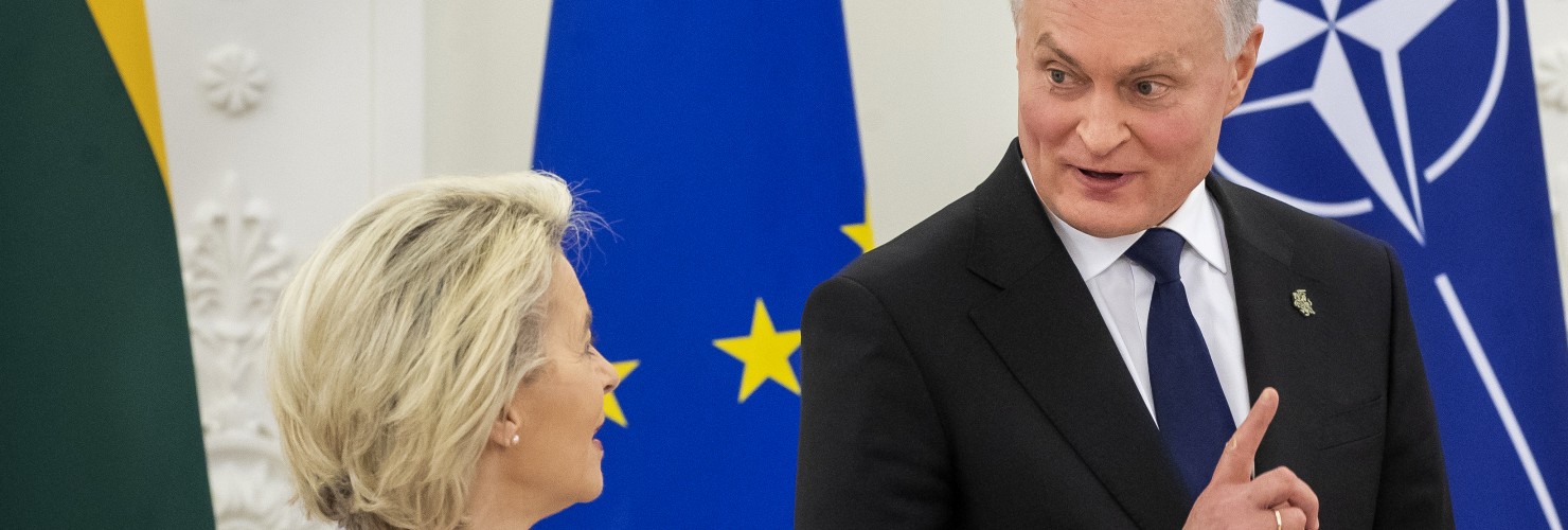 Lithuania's President Gitanas Nauseda, right, and European Commission President Ursula von der Leyen speak prior to their meeting at the Presidential palace in Vilnius, Lithuania, Sunday, Nov. 28, 2021