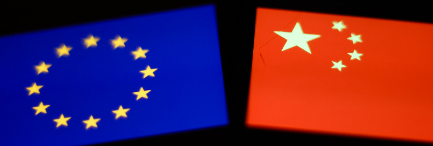 Flags of European Union and China displayed on screens