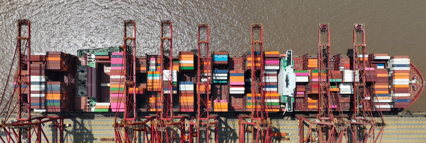  Ships carry out container loading and unloading operations at the Dapukou container Terminal at Zhoushan Port, Zhejiang province, China, April 9, 2024.