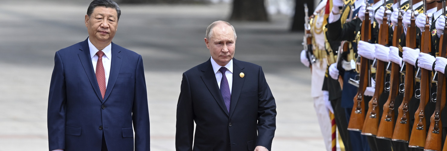 Chinese President Xi Jinping, left, and Russian President Vladimir Putin review the honor guard during an official welcome ceremony in Beijing, China, Thursday, May 16, 2024.