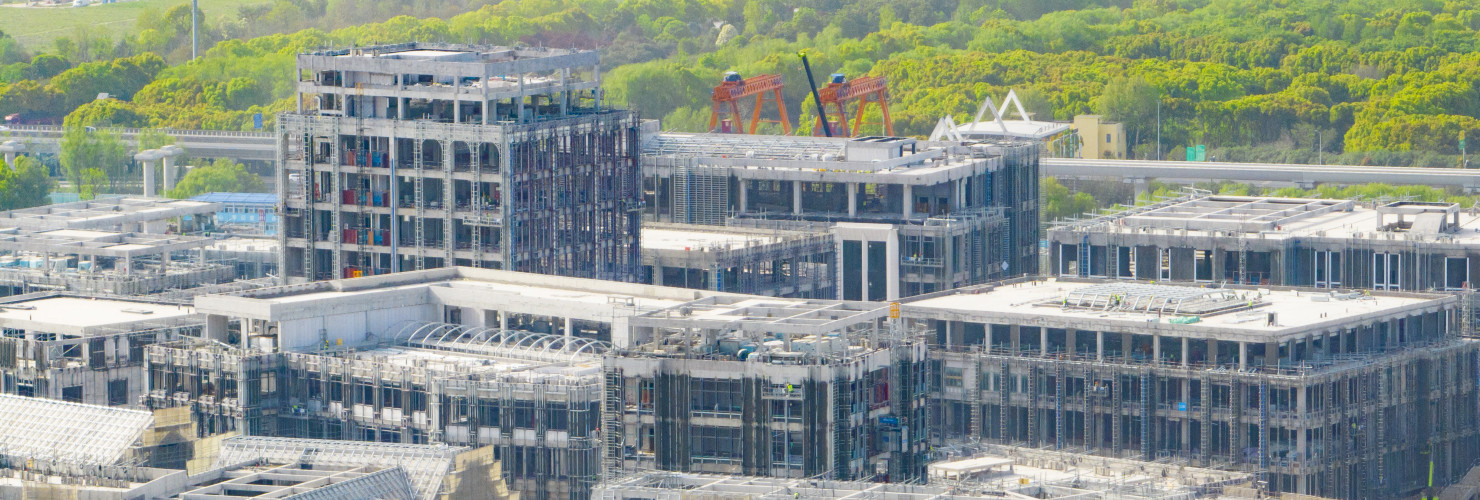 Builders, along with hundreds of engineering vehicles and ladders, push forward the construction of key projects at Huawei's Qingpu R&D Center in Shanghai, China, April 12, 2023.