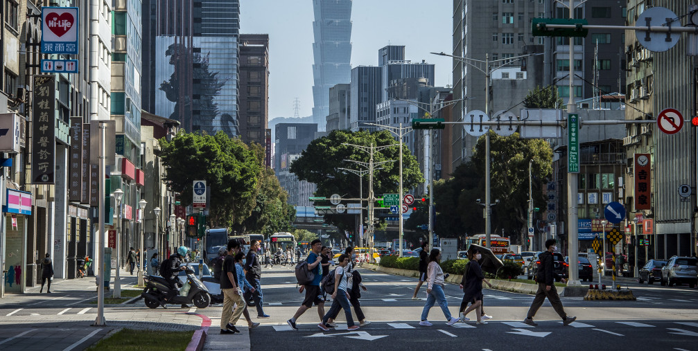 Passersby walk in downtown Taipei, Taiwan