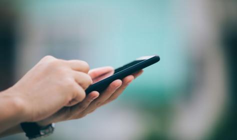 Close-up of a person holding a smartphone