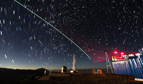 This composite photo taken on Dec. 9, 2016 shows a satellite-to-earth link established between quantum satellite "Micius" and the quantum teleportation experiment platform in Ali, Tibet Autonomous Region.