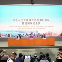  Chief Executive Carrie Lam (C), the Secretary for Justice Teresa Cheng (L) and the HKSAR government's Secretary for Security John Lee Ka-chiu attend a press conference in Hong Kong, July 1 2020