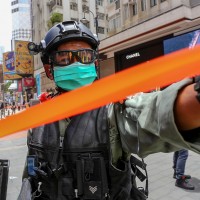 Policy Cordon off area with orange tape in Hong Kong