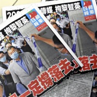 Newspapers of Hong Kong's Apple Daily are pictured at a stand in Hong Kong