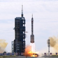 A Long March-2F Y12 rocket carrying a crew of Chinese astronauts in a Shenzhou-12 spaceship lifts off at the Jiuquan Satellite Launch Center in Jiuquan in northwestern China, Thursday, June 17, 2021