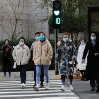 People Crossing Street in Beijing