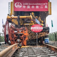 Workers from China Railway No.2 Engineering Group (CREC-2) weld the first seamless rails for the China-Laos railway in the northern suburb of Vientiane, Laos, on June 18, 2020