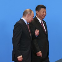 Chinese President Xi Jinping (R) walks with Russian President Vladimir Putin (L) during the welcome ceremony at Yanqi Lake during the Belt and Road Forum, in Beijing, China, 15 May 2017. The Belt and Road Forum runs from 14 to 15 May, which is expected to lay the groundwork for Beijing-led infrastructure initiatives aimed at connecting China with Europe, Africa and Asia.