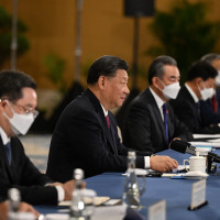 China's President Xi Jinping (C) attends a meeting on the sidelines of the G20 Leaders' Summit in Bali, Indonesia, 15 November 2022. 