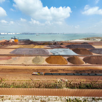 A train pulls into Dongwu port District to carry an inbound iron ore unloaded by a foreign ship in Putian, Fujian province, China, Sept 29, 2022