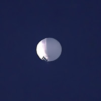 A high altitude balloon floats over Billings, Mont., on Wednesday, Feb. 1, 2023. 