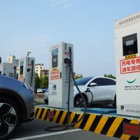 A new energy electric vehicle charging pile is seen in Yichang, Hubei province, China, July 31, 2022.