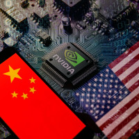 The flags of China and the USA are being displayed on a smartphone, with an NVIDIA chip visible in the background.