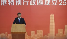 China's President Xi Jinping delivers a speech after arriving for the upcoming handover anniversary by train in Hong Kong, Thursday, June 30, 2022. 