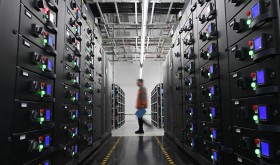 A worker maintains equipments at a cloud computing base under construction in Zhongwei City