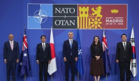 Australia's Prime Minister Anthony Albanese, Japan's Prime Minister Fumio Kishida, NATO Secretary General Jens Stoltenberg, New Zealand's Prime Minister Jacinda Ardern and South Korea's President Yoon Suk Yeol, from left, pose for media in a group photo of Indo-Pacific partners nations during the NATO summit in Madrid, Spain, on Wednesday, June 29, 2022.