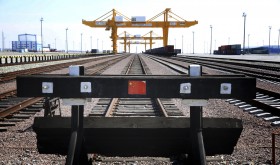 Chinese flag is seen on the end of a railway track at the Khorgos Gateway, one of the world's largest dry dock in a remote crossing along Kazakhstan's border with China near Khorgos.