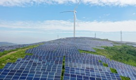 A wind-complementary power station is seen on a barren hill in Xuzhuang town, Shanting district of Zaozhuang, Shandong Province, China, Aug 26, 2022.